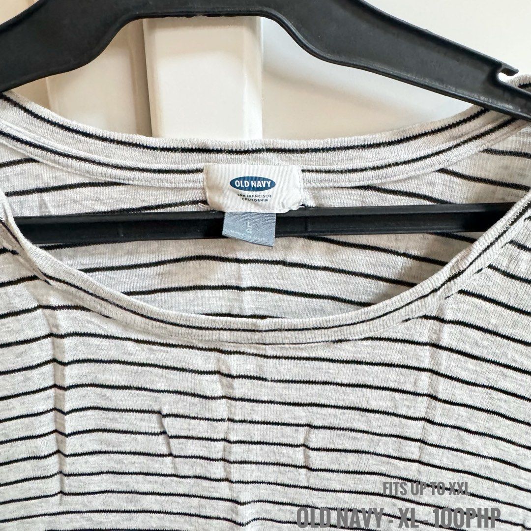 Old Navy Striped T-shirt XL (Category: Dresses) located in Binan City. Submitted by lealmeda (Listing ID 1422072345, Image 2). Description: - Old Navy striped long-sleeved t-shirt - Gray with black stripes - Round neck - Size: XL (fits up to XXL) - Condition: Good.