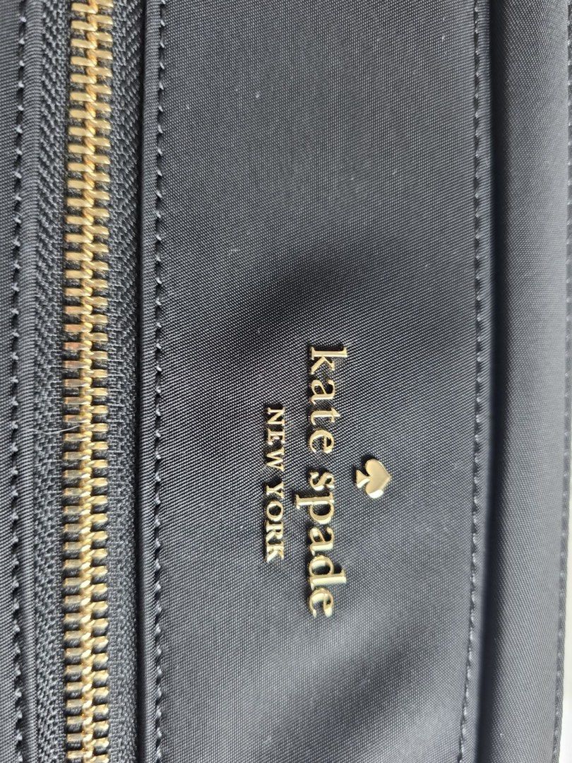 Original Kate Spade Laptop Sleeve with Strap (Category: Laptop Bags & Sleeves) located in Quezon City. Submitted by burpysellsstuff (Listing ID 1421948303, Image 3). Description: - Black Kate Spade laptop sleeve - Gold zipper - Multiple interior compartments - Features Kate Spade label - Includes original tags and packaging - Designed for stylish laptop protection.