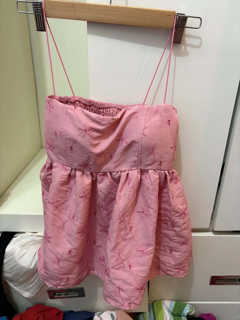 Pink Embroidered Top (Category: Sleeveless) located in Quezon City. Submitted by thingsdeclutter (Listing ID 1422025794, Image 1). Description: Pink top with floral embroidery, thin straps, and flared hem. Lightweight fabric, perfect for warm weather..
