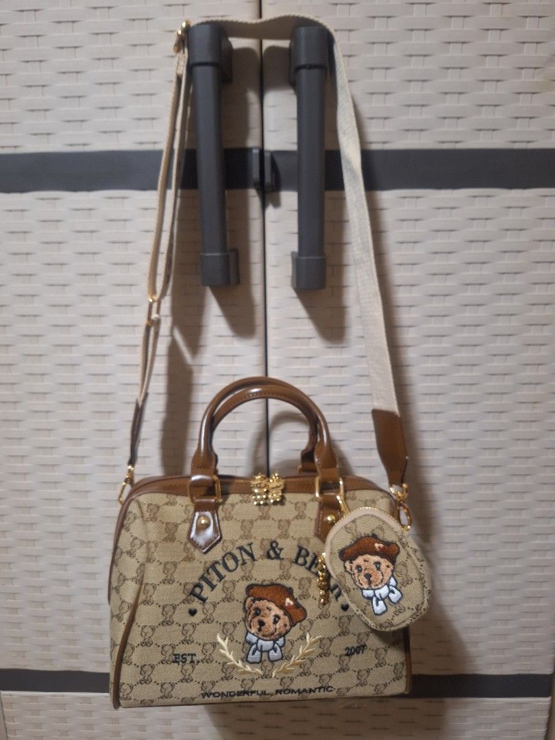 Piton & Bear 2-way bag with Coin Purse (Category: Luxury Bags & Wallets) located in Manila. Submitted by luckycharm_m (Listing ID 1422018289, Image 1). Description: bought last January 2026 at tiktok for 1.5k like new medium size canvas material nice bag sling and top handle bag with dust bag..