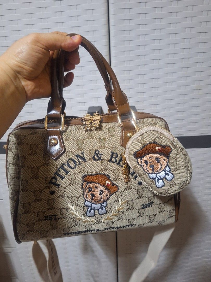 Piton & Bear 2-way bag with Coin Purse (Category: Luxury Bags & Wallets) located in Manila. Submitted by luckycharm_m (Listing ID 1422018289, Image 2). Description: bought last January 2026 at tiktok for 1.5k like new medium size canvas material nice bag sling and top handle bag with dust bag..