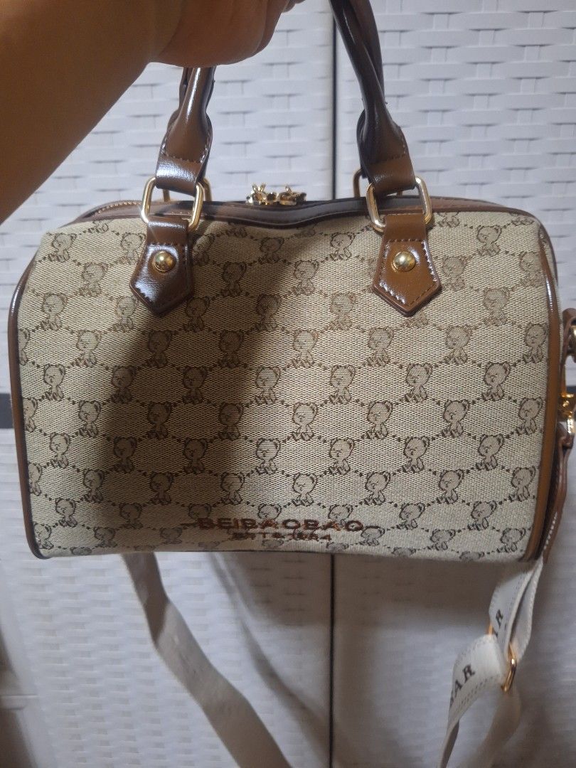 Piton & Bear 2-way bag with Coin Purse (Category: Luxury Bags & Wallets) located in Manila. Submitted by luckycharm_m (Listing ID 1422018289, Image 3). Description: bought last January 2026 at tiktok for 1.5k like new medium size canvas material nice bag sling and top handle bag with dust bag..