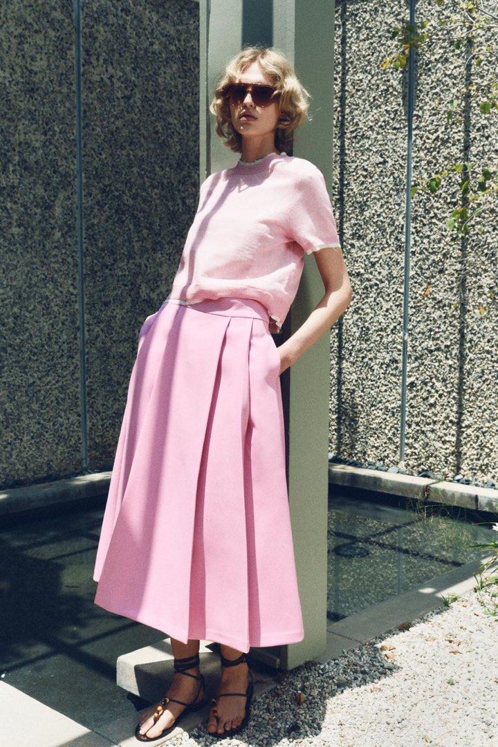 Pleated Midi Skirt - Pink (Category: Skirts) located in Makati City. Submitted by zaraprelove12345 (Listing ID 1421984141, Image 2). Description: - Elegant pink midi skirt - Pleated design - High-waisted - Flowy silhouette - Dress up or down - Suitable for casual or formal events.