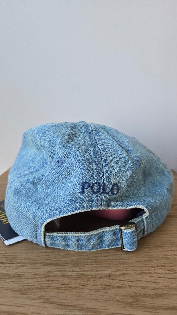 Polo Ralph Lauren Denim Cap (Authenticated QR) (Category: Caps & Hats) located in Makati City. Submitted by loisandclark (Listing ID 1422008878, Image 2). Description: - Authentic Polo Ralph Lauren denim cap - Features the iconic Polo logo - Brand name embroidered on the back - Adjustable strap for a comfortable fit - Made from durable denim - Comes with original tags - Authenticated QR Price: PHP 5,000 nego Condition: Brand new MOP: BPI/BDO/Gcas
