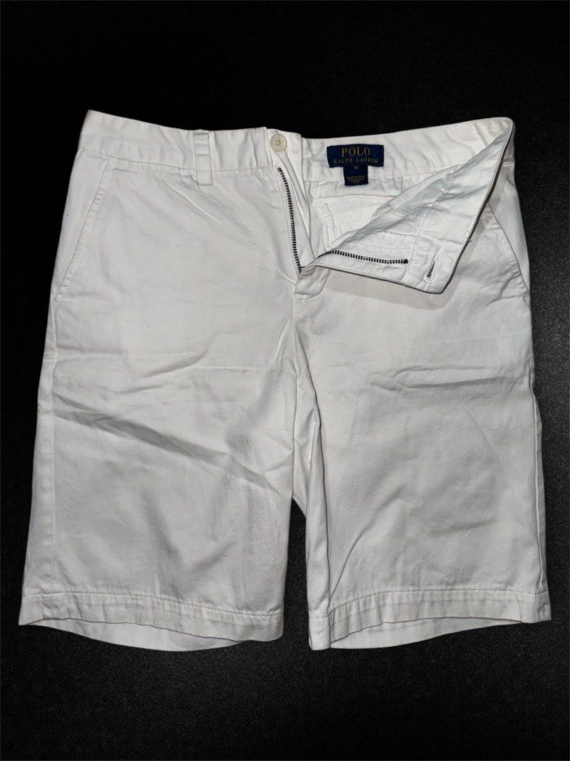 Polo Ralph Lauren White Shorts (Category: Shorts) located in Hermosa. Submitted by xonarchive (Listing ID 1422066358, Image 1). Description: - Polo Ralph Lauren white shorts - Size: 36 - Features: - Button and zipper closure - Two front pockets - Two back pockets - Polo Ralph Lauren logo on the back.