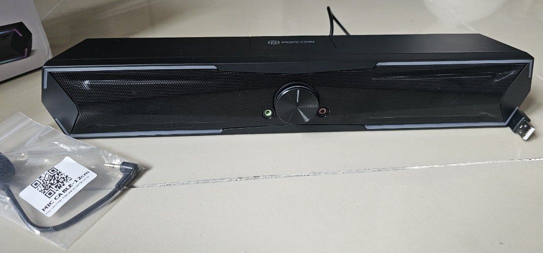 Popcorn CS012ARGB RGB Gaming Speaker (Category: Soundbars, Speakers & Amplifiers) located in Marikina City. Submitted by anbierose (Listing ID 1421954709, Image 3). Description: - Popcorn CS012ARGB Gaming Speaker - RGB Breathing Light - USB and Bluetooth Modes - Volume Control Knob - Audio Input/Output Ports - Includes USB Cable and User Manual - Sleek Black Design.