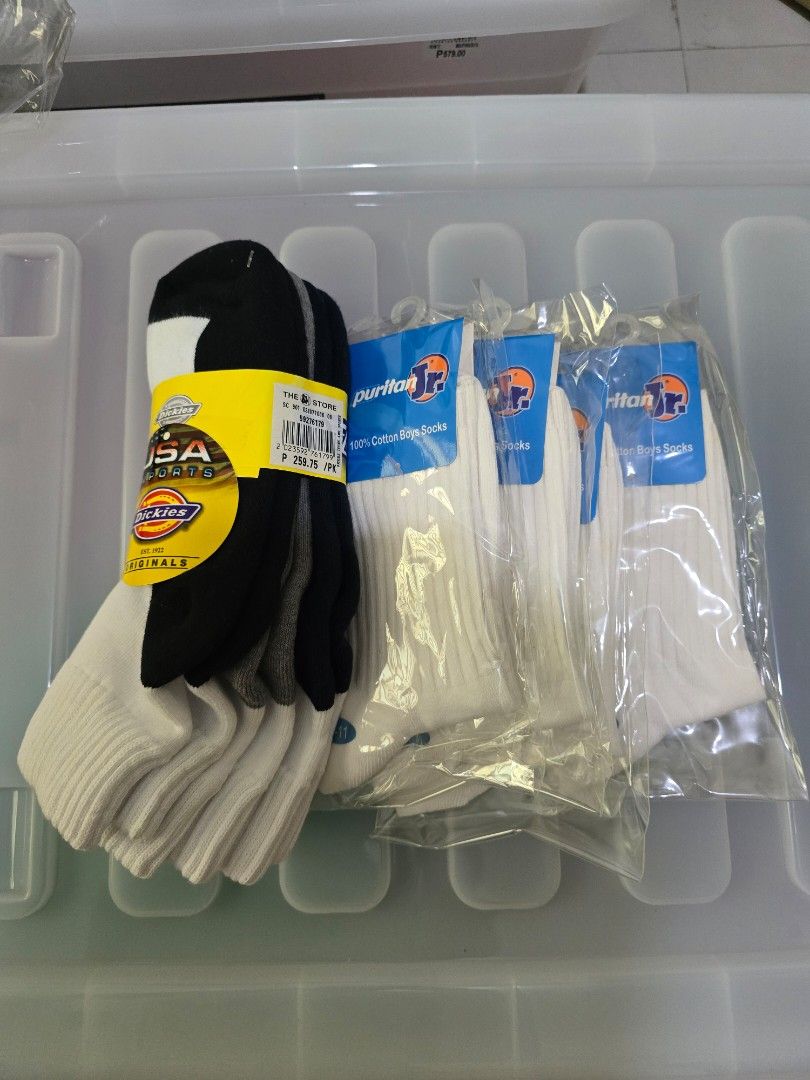 Puritan Jr. and Dickies Socks (Category: Babies & Kids Fashion) located in Valenzuela. Submitted by SecondChances (Listing ID 1421979403, Image 1). Description: - Socks available in white, black, and grey. - White socks are Puritan Jr. brand. - Black socks are Dickies brand. - Multiple pairs included. - Packaged in plastic. - length 6-7 inches (relaxed).