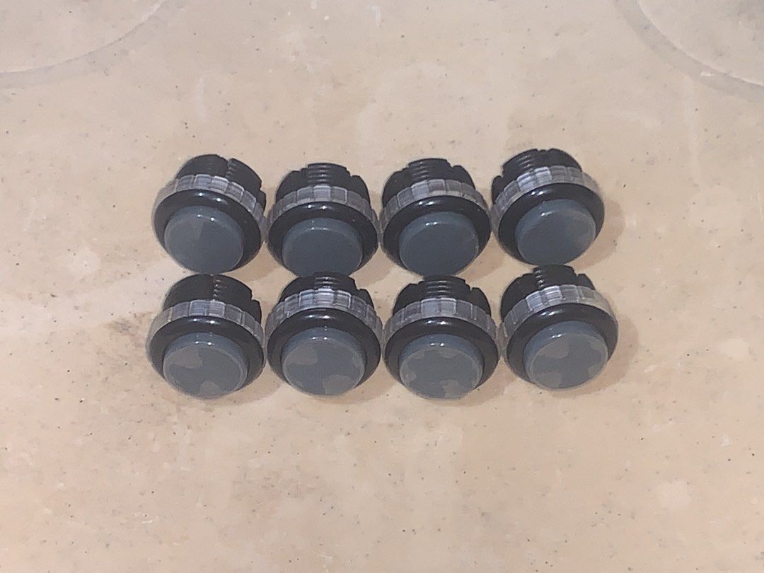 Qanba Gravity LX Solid Grey Black A09 30mm Screw in button set TRADE (Category: Controllers) located in Taguig. Submitted by paradise.collections (Listing ID 1422062003, Image 1). Description: - Qanba Gravity LX Solid Grey Black A09 30mm Screw in button set - Vibrant grey center with black outer ring - Ready for arcade project installation - Standard connector for easy wiring -Open trade to Translucent LX version Pickup at Taguig.