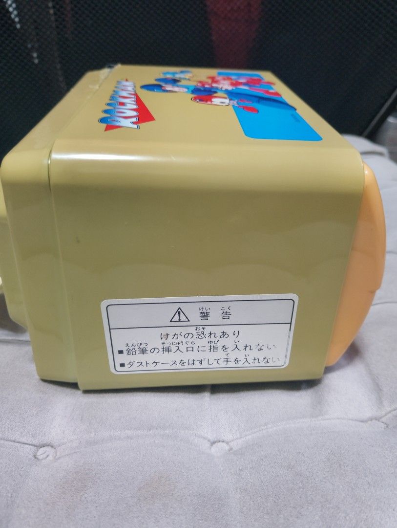 Rockman Mitsubishi Pencil Sharpener (Category: Vintage Collectibles) located in Manila. Submitted by boyhet.thrift15 (Listing ID 1422054748, Image 3). Description: - Vintage Rockman (Mega Man) pencil sharpener - Unique design featuring Rockman characters - Made by Mitsubishi Pencil - Includes power cord - Features a shavings drawer - Adjustable sharpness dial - not working /damage bandang gilid -selling 600.