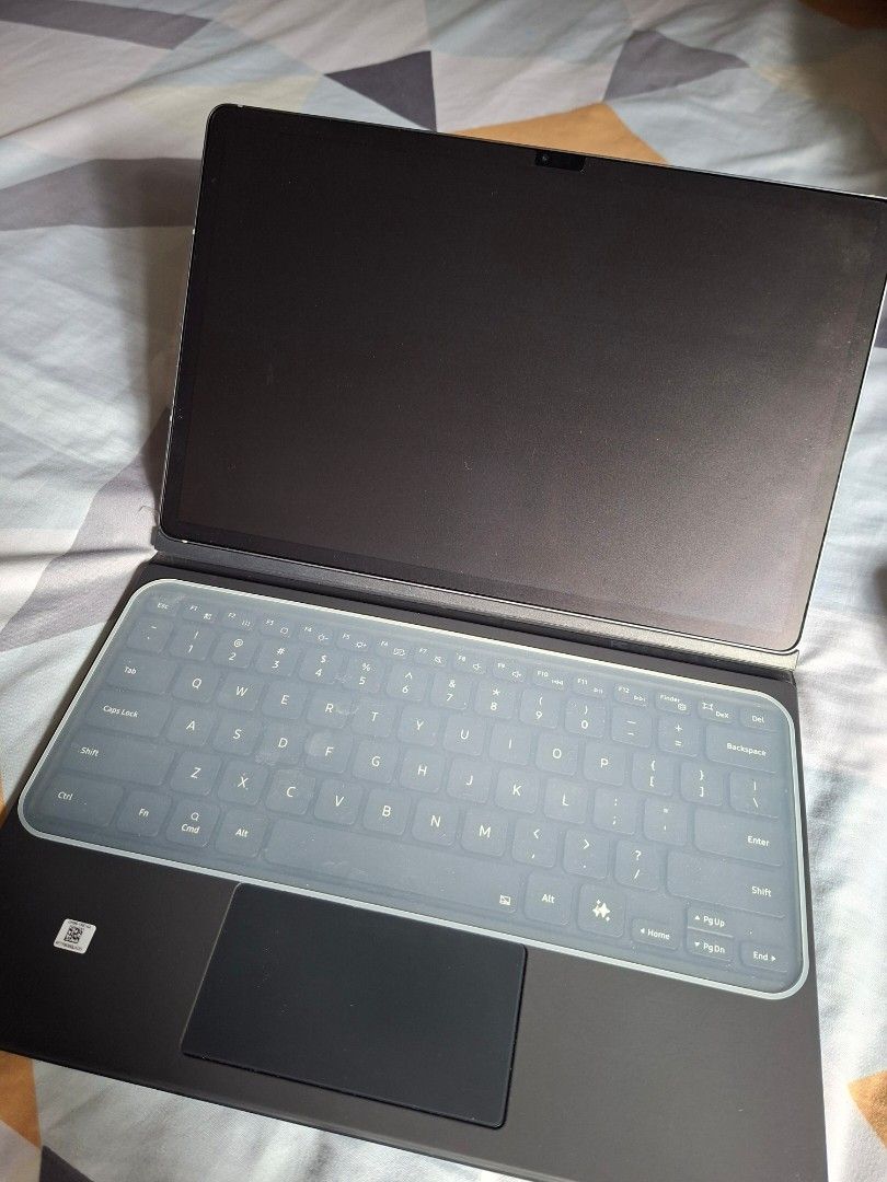 Samsung Galaxy Tab S10+ with Keyboard (Category: Android) located in Muntinlupa City. Submitted by quickfire-7364 (Listing ID 1421978357, Image 2). Description: - Samsung Galaxy Tab S10+ (Moonstone Gray) - Includes S Pen - With box - Comes with keyboard cover with trackpad - Tablet shown open and closed - Globe locked - RFS: Need cash - Negotiable price.