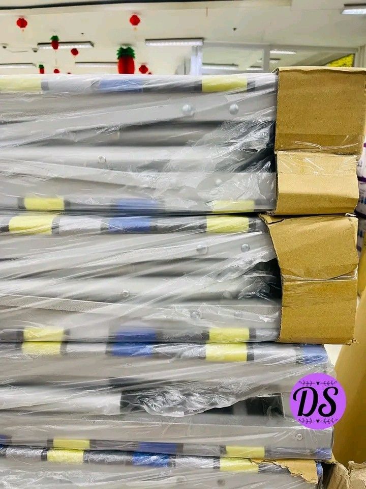 Single Bed Frame with Mattress (Category: Bed Frames & Mattresses) located in Manila. Submitted by micoooy (Listing ID 1421944442, Image 3). Description: - New single bed frame - Foldable white metal frame - Includes striped mattress (blue, yellow, gray) - Item is brand new - Still in original packaging.
