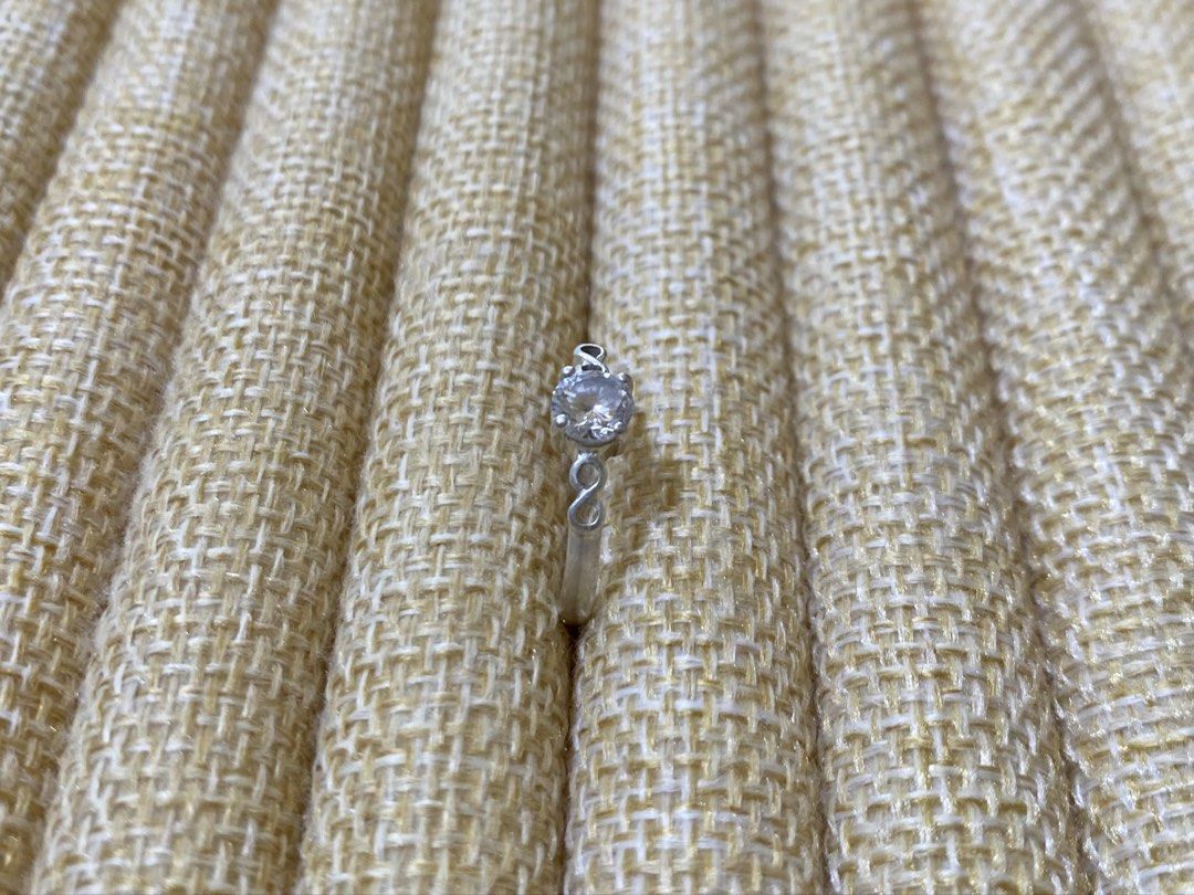 Solitaire Infinity engagement or promise ring | S925 (Category: Rings) located in Solano. Submitted by silvershineph (Listing ID 1421951773, Image 2). Description: ✧ Product / Item Name: Solitaire Infinity engagement or promise ring ✧ Description: A solitaire setting featuring a single large, round-cut center stone. The band is accented with delicate infinity symbols flanking the center stone, symbolizing eternal love and commitment. ✧ Size: 6.5 