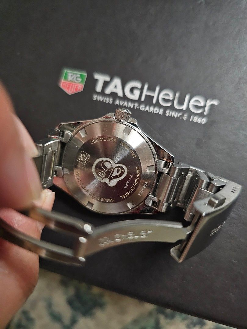 Tag Heuer Aquaracer Quartz Watch (Category: Luxury Watches) located in Manila. Submitted by mymyg (Listing ID 1421945174, Image 3). Description: - Authentic Tag Heuer Aquaracer - Black dial - Stainless steel bracelet - Quartz movement - Date display - Includes original box, warranty card, and instruction manual - Sapphire crystal - Water-resistant to 300 meters - Folding clasp with safety release - serviced in 2022 - fresh batteries - original ex