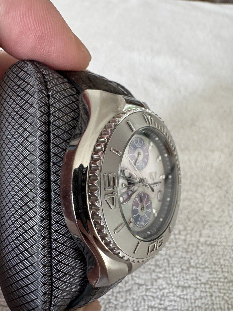 TechnoMarine Sport Chronograph Watch (Category: Men's Watches) located in Pasig City. Submitted by funnelboy (Listing ID 1421998757, Image 2). Description: TechnoMarine Sport chronograph watch with a silver-tone stainless steel case and a black leather strap. Features a mother-of-pearl dial with three sub-dials and luminous hands and markers. The bezel has engraved numerals. Includes chronograph pushers and a crown. The watch also has a date disp