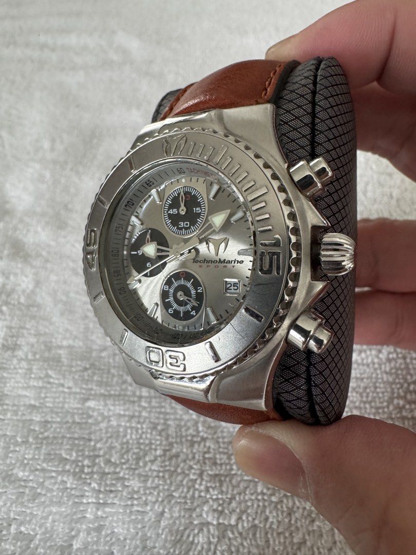 TechnoMarine Sport Watch (Category: Men's Watches) located in Pasig City. Submitted by funnelboy (Listing ID 1421998579, Image 2). Description: - TechnoMarine Sport watch - Silver dial - Brown leather strap - Chronograph subdials - Date display at 3 o'clock - Tachymeter bezel - Stainless steel case - Crown with pushers.