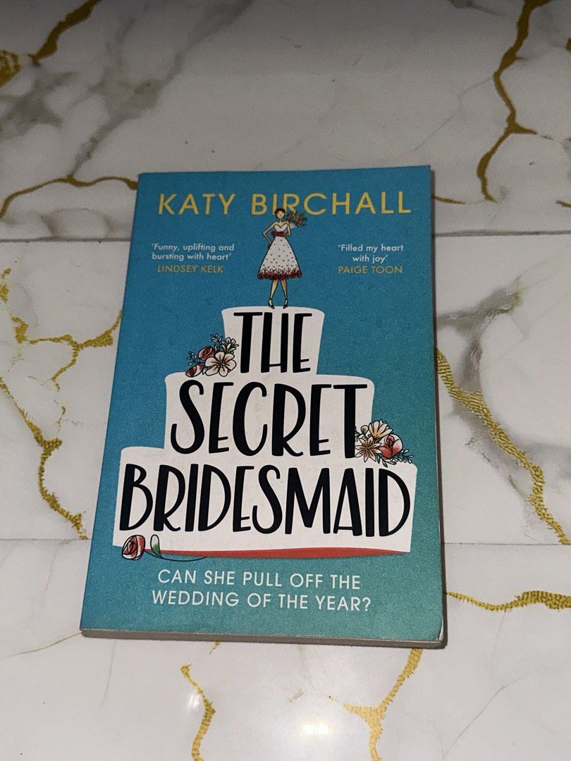 The Secret Bridesmaid by Katy Birchall (Category: Storybooks) located in Manila. Submitted by shaaan73 (Listing ID 1421980107, Image 1). Description: Secret Bridesmaid by Katy Birchall. Paperback with a teal cover and cake design. Pages show slight yellowing..