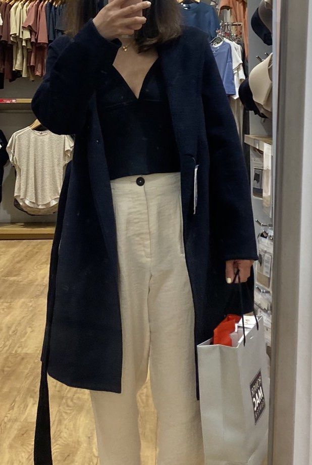 Uniqlo Navy Coat (Category: Coats, Jackets and Outerwear) located in Quezon City. Submitted by mdlrrr (Listing ID 1421984000, Image 1). Description: Uniqlo navy coat - Wrap design with tie belt - Comes with a hood - Longline silhouette - Perfect for layering - Too many coats. Never had the chance to use this. .