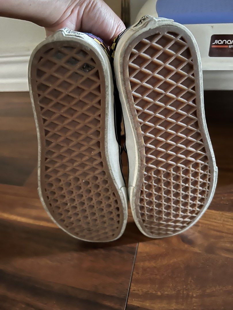 Vans Checkerboard Slip-On Sneakers (Category: Sneakers) located in Angeles City. Submitted by chiccharm (Listing ID 1422026634, Image 2). Description: - Vans slip-on sneakers - Colorful checkerboard pattern - Black interior - White soles - Some wear on soles - Vans logo on side and insole.