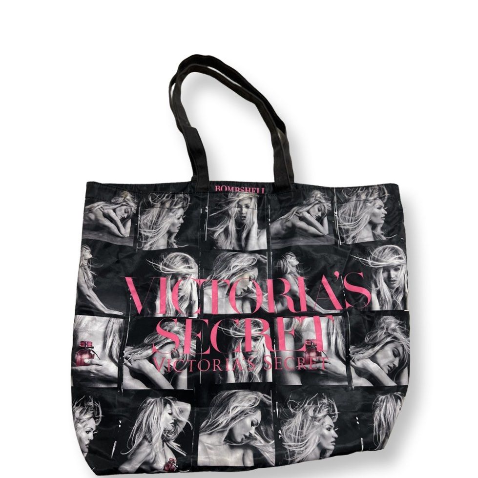 Victoria's Secret Bombshell Tote Bag (Category: Tote Bags) located in Makati City. Submitted by elideclutterss (Listing ID 1422024929, Image 1). Description: - Authentic Victoria's Secret tote bag - Features a black background with multiple images of a woman - Pink "Victoria's Secret" logo - Two black carrying handles - Made of durable material - Large size, perfect for everyday use.