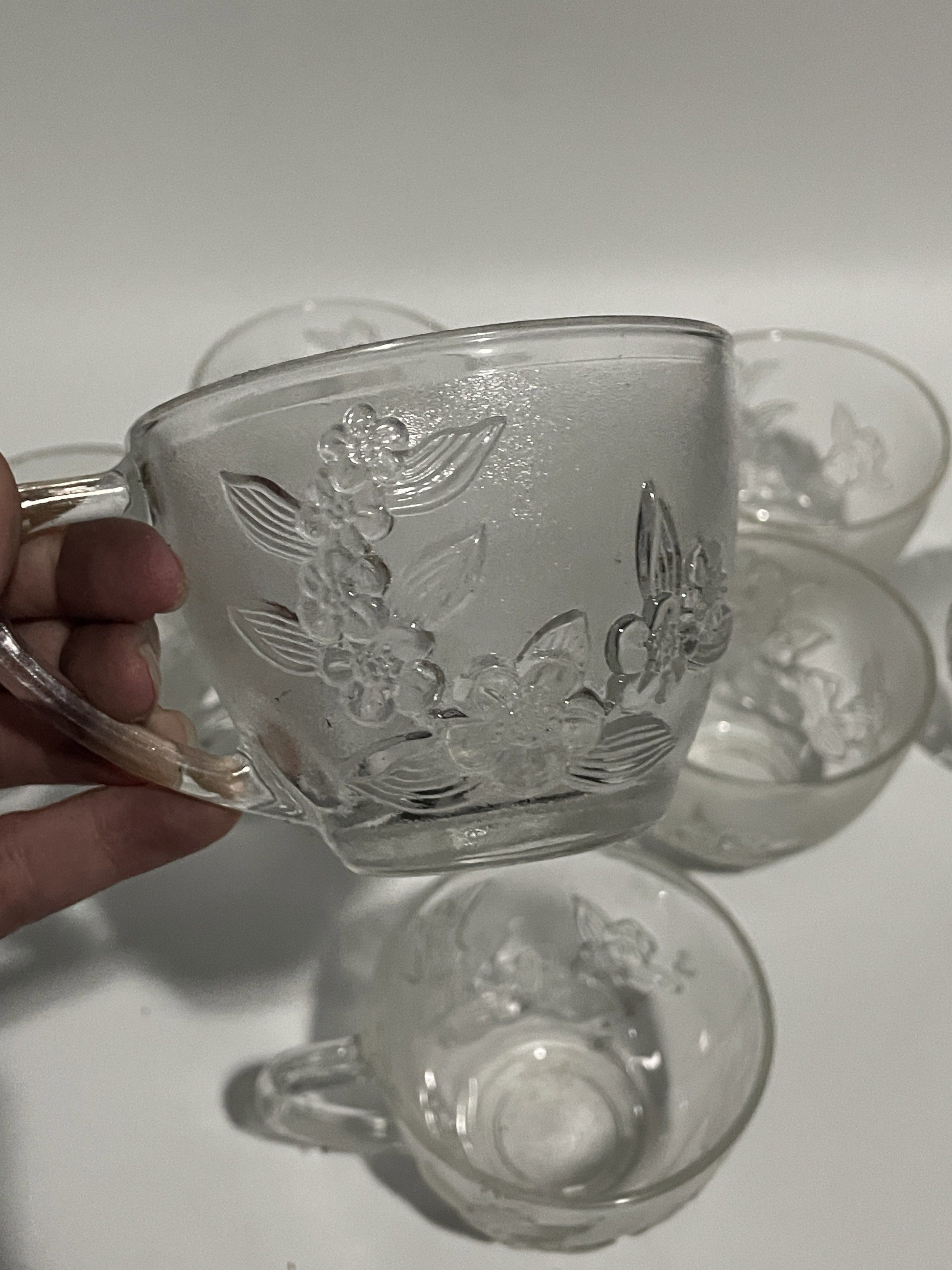 Vintage Clear Glass Tea Cups Set (Category: Coffee & Tea Tableware) located in Bacoor. Submitted by milesgm (Listing ID 1422025247, Image 2). Description: - Set of 8 clear glass teacups - Features an embossed decorative design - Unused but missing box - Made in Indonesia .