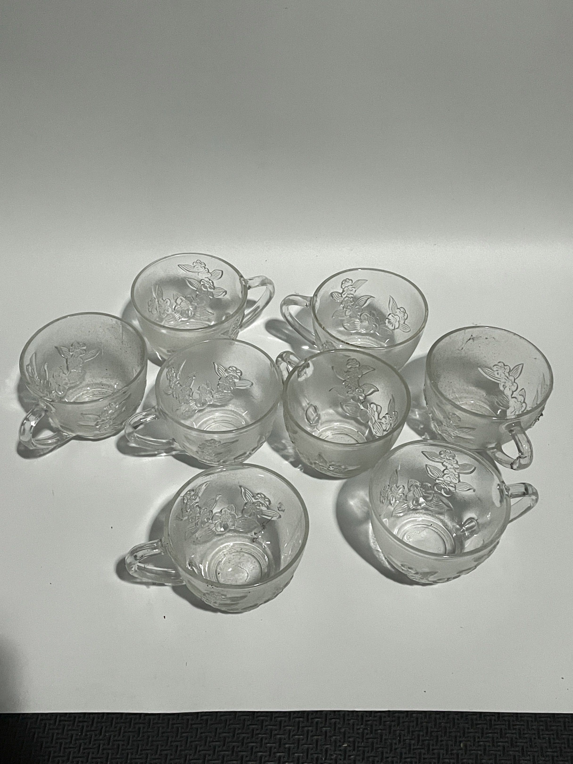 Vintage Clear Glass Tea Cups Set (Category: Coffee & Tea Tableware) located in Bacoor. Submitted by milesgm (Listing ID 1422025247, Image 1). Description: - Set of 8 clear glass teacups - Features an embossed decorative design - Unused but missing box - Made in Indonesia .