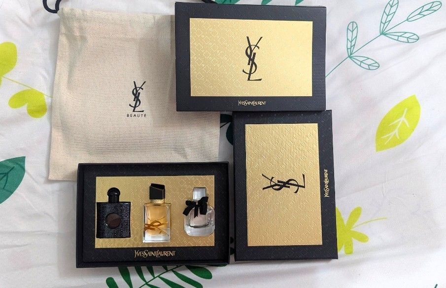 Yves Saint Laurent Mini Perfume Set (Category: Fragrance & Deodorants) located in San Fernando. Submitted by jctut (Listing ID 1422052437, Image 1). Description: - YSL Mini Perfume Set - Includes three mini perfumes - YSL Libre, Mon Paris, Black Opium - Comes in a black box with gold accents - Includes a branded pouch - Features different scents - Ideal for travel or gifting.