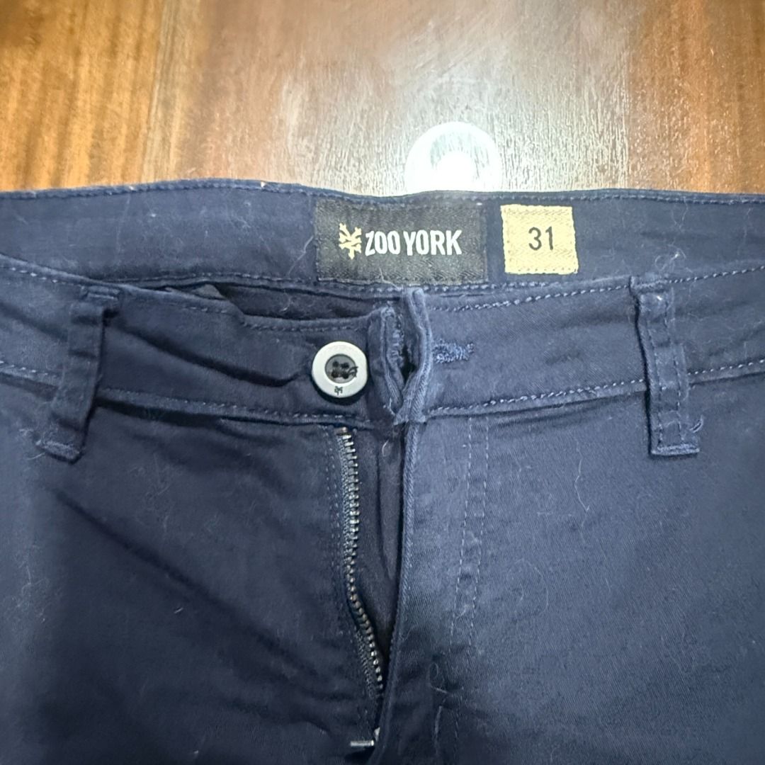 Zoo York Navy Blue Pants Size 31 (Category: Jeans) located in Cavite. Submitted by red.19 (Listing ID 1422038077, Image 2). Description: - Slim Fit - Navy blue Zoo York pants - Size: 31 - Closure: Button and zipper - Pockets: Front and back - Waist: Approximately 16 inches across - Inseam: Approximately 32 inches - Condition: Good.