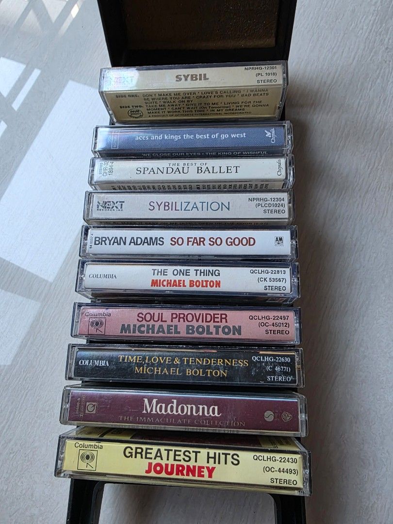 Assorted Music Cassette Tapes (Category: CDs & DVDs) located in San Juan City. Submitted by dailydealsphest2010 (Listing ID 1420049929, Image 2). Description: - Assorted music cassette tapes - Featuring artists like Bryan Adams, Madonna, Def Leppard, and Michael Bolton - Album titles visible on labels - Ideal for music enthusiasts and collectors.