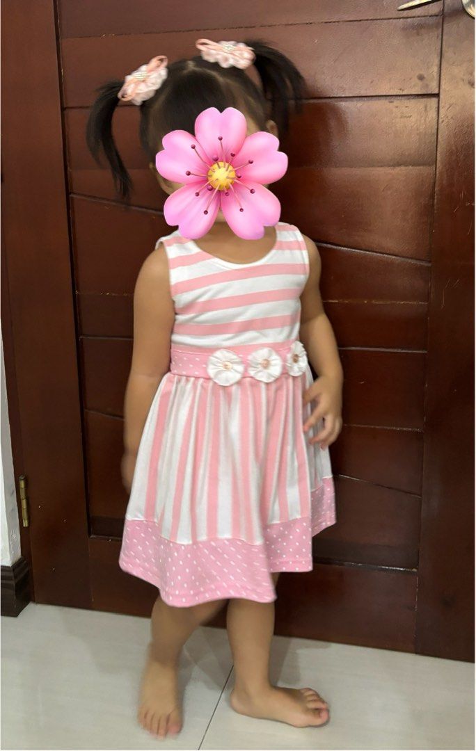 Bambini Striped Dress - Size M (Category: Babies & Kids Fashion) located in Cavite. Submitted by decluttererminer (Listing ID 1421740904, Image 3). Description: - Brand: Bambini - Size: M - Design: Pink and white stripes - Style: Sleeveless dress - Features: Round neckline, bow detail at waist, polka dot hemline - First owner (my baby girl) - Used once - Last price posted - Washed - Mode of payment: GCash/BPI - Mode of delivery: J&T - Payment fir