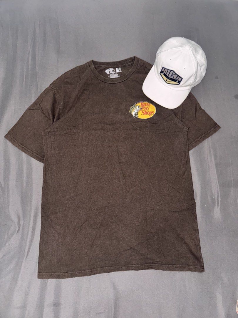 Bass Pro Shops T-shirt (Category: Tshirts & Polo Shirts ) located in Manila. Submitted by jpabss (Listing ID 1422167774, Image 1). Description: 💥Bass Pro Shops T-shirt: 💥Size: M 💥Color: Brown 💥Features: Bass Pro Shops logo on front, hunting graphic on back. Made i 💥Width: 21 💥Length: 30 💥No Issue.