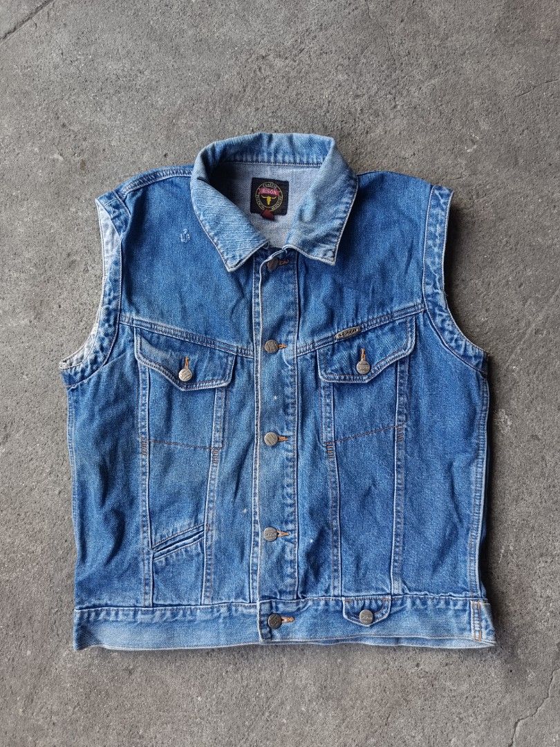 Bison Vintage Denim Vest (Category: Vests) located in Manila. Submitted by jhayviereal15 (Listing ID 1422141516, Image 1). Description: DIMES : 21X25 - Classic denim vest - Button-up front - Two chest pockets - Two side pockets - Collar - Brand patch on back - Medium wash denim - Branded buttons - Perfect for layering.