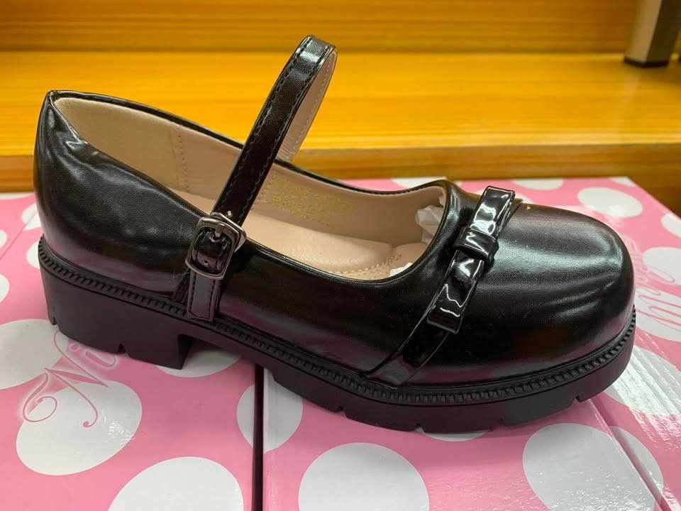 Black School Shoes (Category: Babies & Kids Fashion) located in Manila. Submitted by raredeer-4deb4e (Listing ID 1422130552, Image 2). Description: - Brand new black Mary Jane school shoes - Features a classic strap and buckle closure - Stylish glossy finish - Durable chunky sole - Comes in a cute pink box with white polka dots - Never been worn.
