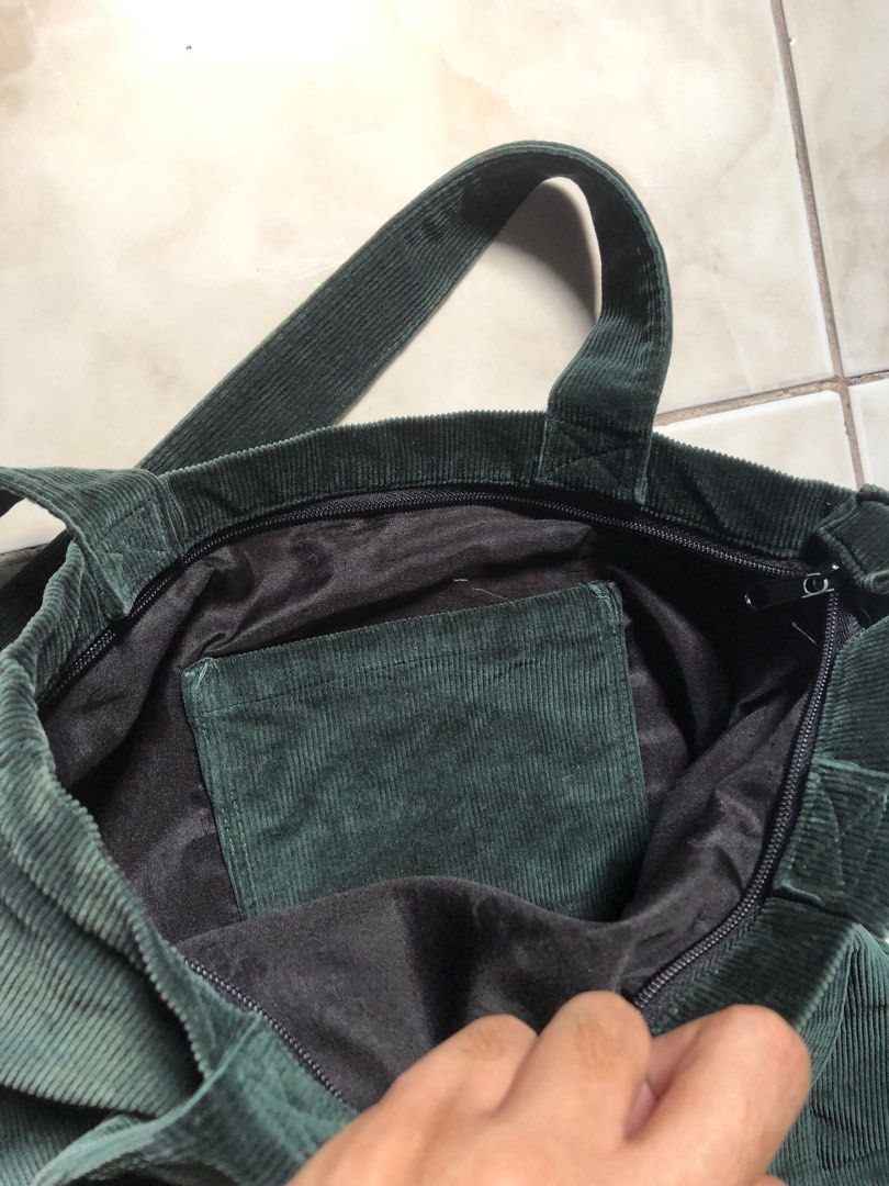 chapter corduroy tote bag (Category: Tote Bags) located in Pasig City. Submitted by teddae (Listing ID 1422154341, Image 3). Description: chapter corduroy tote bag - dark green (color may vary due to lighting) - with zipper, 1 pocket in front and 1 inside the tote - w 14, l 15 rarely used, no flaws 400, pasig loc.