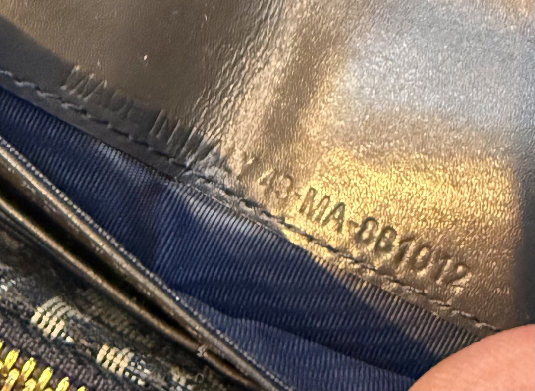 Christian Dior Saddle Wallet (Category: Luxury Bags & Wallets) located in Manila. Submitted by thebodega88 (Listing ID 1422132066, Image 2). Description: - Christian Dior Saddle Wallet - Features iconic Dior Oblique canvas - Made in Italy - Gold-tone zipper with Christian Dior Paris branding - Leather lining with Christian Dior Paris logo - Snap closure with Dior logo - Serial number: 43-MA-0012.