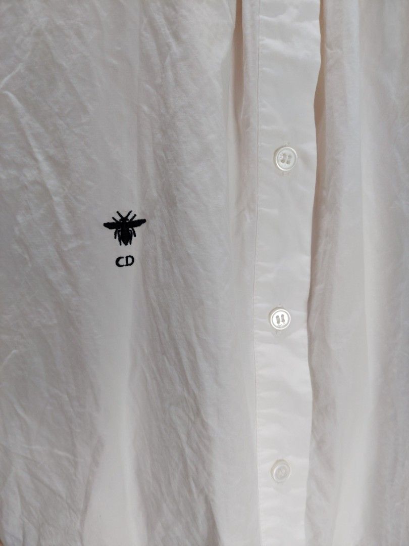 Christian Dior White Cotton Blouse (Category: Luxury Apparel) located in Abucay. Submitted by alvinthrif57836 (Listing ID 1422209567, Image 3). Description: - DIOR White Cotton Blouse - Made in Italy. - Size 36 - No issue - Excellent - Fit To Small To Medium.