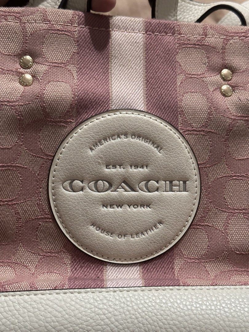 Coach Mini Tote DempseyBag (Category: Tote Bags) located in Quezon City. Submitted by decluttertherapymnl (Listing ID 1422222079, Image 2). Description: For Sale Coach Mini Dempsey Tote Bag Pink As it is. RFS Declutterin Payment online or upon pick up Pasig Area.