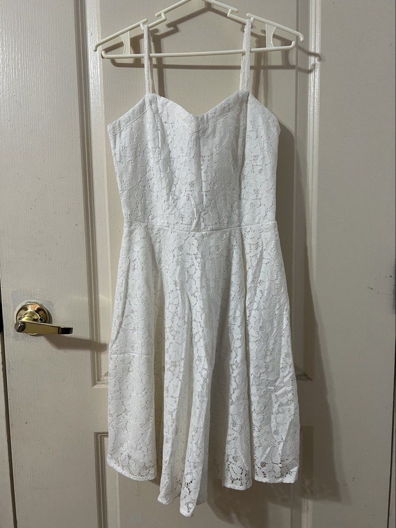Cotton On White Lace Dress (Category: Dresses) located in Silang. Submitted by _superjea (Listing ID 1422162113, Image 1). Description: - Cotton On white lace dress - Adjustable spaghetti straps - Sweetheart neckline - Fitted bodice with flared skirt.