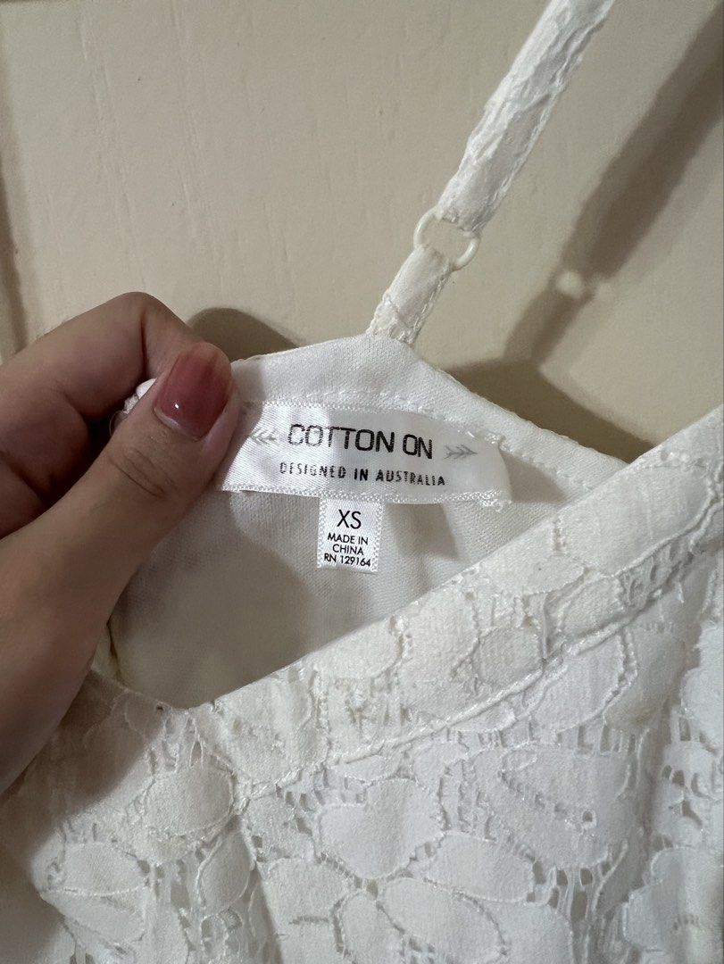 Cotton On White Lace Dress (Category: Dresses) located in Silang. Submitted by _superjea (Listing ID 1422162113, Image 3). Description: - Cotton On white lace dress - Adjustable spaghetti straps - Sweetheart neckline - Fitted bodice with flared skirt.