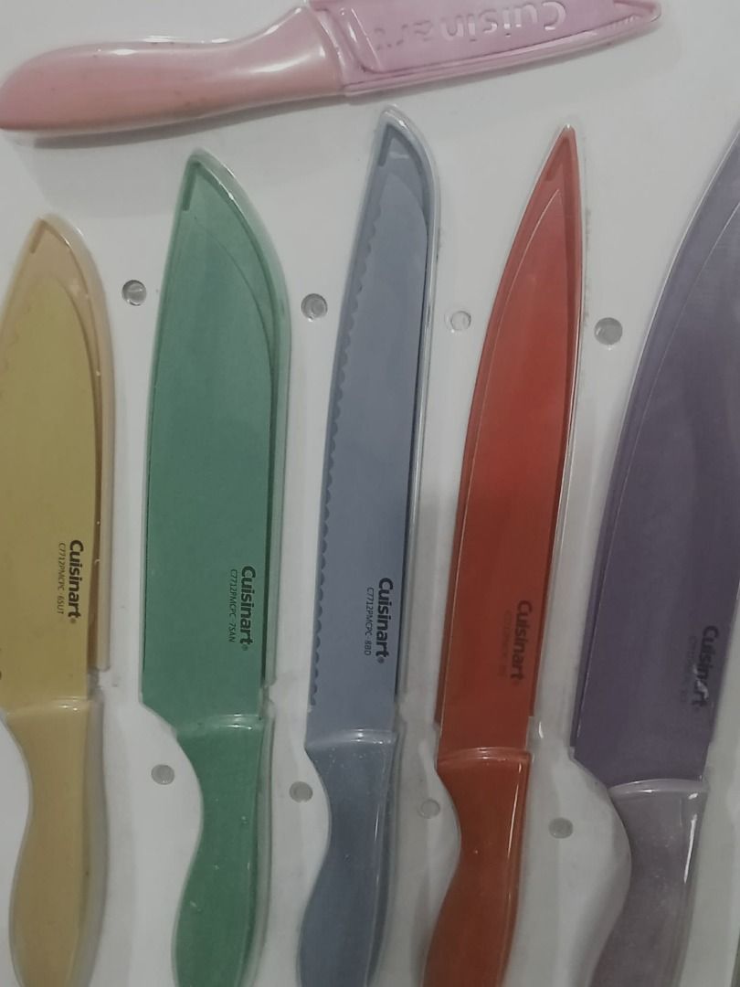 Cuisinart Knife Set with Sheaths Php 3,000 plus in online shops (Category: Knives & Chopping Boards) located in Caloocan City. Submitted by 2nddesignf33843 (Listing ID 1422109795, Image 2). Description: - Cuisinart knife set - 5 knives in various colors - Includes protective sheaths for each knife - Brand new, unused condition - Cuisinart branding visible on knives and sheaths - Still in sealed packaging, brand new from the U.S. - Php 1,200.