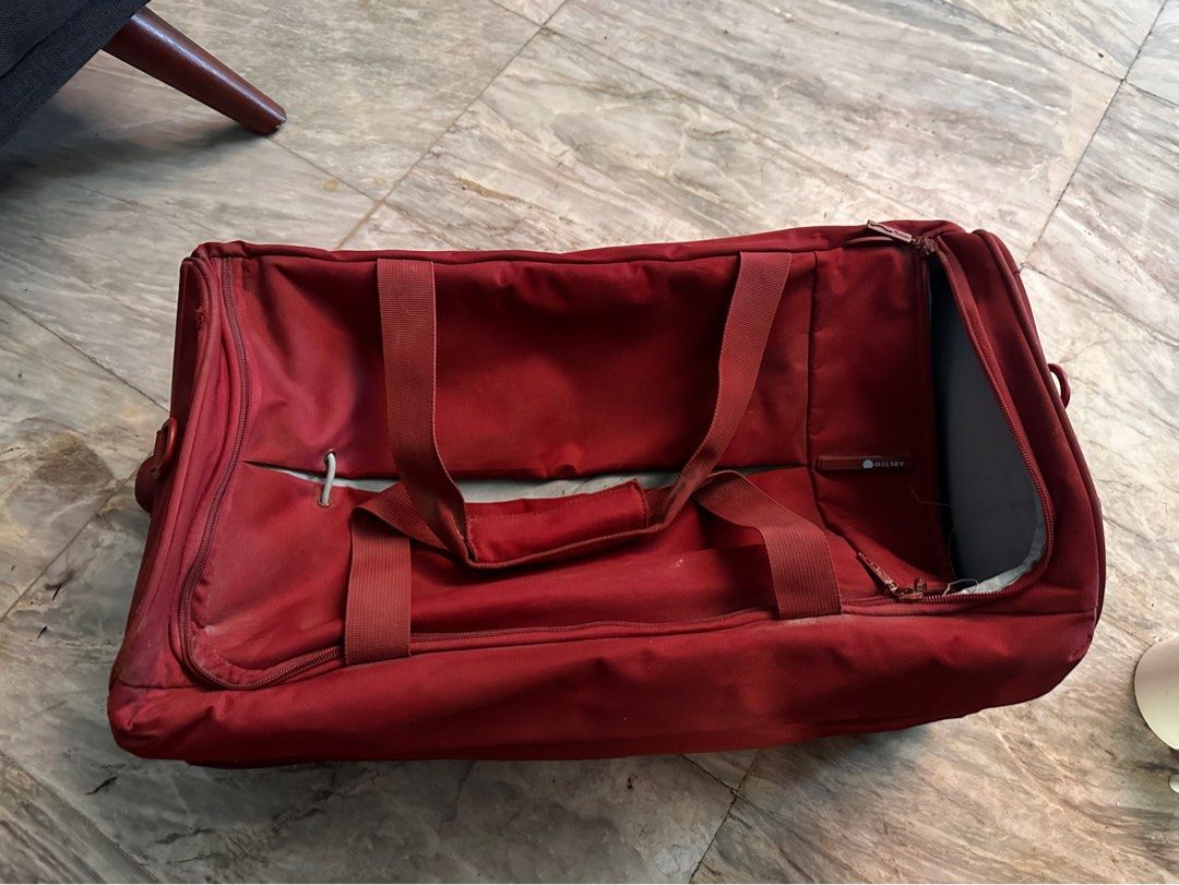 Delsey Rolling Luggage (Category: Luggage) located in Quezon City. Submitted by decluttertherapymnl (Listing ID 1422221403, Image 1). Description: Delsey Duffle Rolling Luggage - Retractable handle - Multiple compartments and interior straps for organization - Top and side handles for carrying - Exterior shows some wear and tear RFS: Decluttering Payment online or upon pick up Pick up at Pasig.