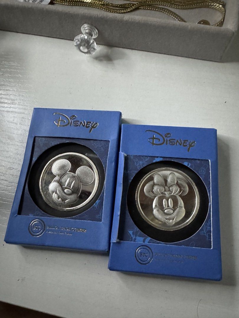 Disney Mickey and Minnie Mouse Silver Coins (Category: Currency) located in Malabon City. Submitted by jessibells (Listing ID 1422223657, Image 1). Description: -Total of 100grams for both, 50g each -pure silver 99.9 -Two Disney silver coins featuring Mickey Mouse and Minnie Mouse. -Comes with original blue boxes, each with the Disney logo..