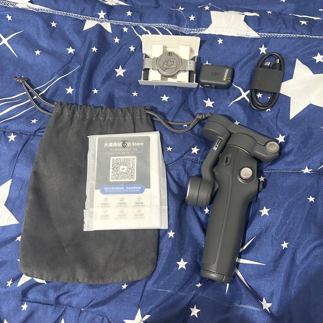 DJI Osmo Mobile 7P Smartphone Stabilizer Gimbal (Category: Gimbals & Stabilizers ) located in Angeles City. Submitted by sh4ine (Listing ID 1422125429, Image 2). Description: - never been used - opened box just to check. hindi pa nagamit talaga - includes stabilizer, carrying case, charging cable, and other accessories - rfs di alam pano gamitin.