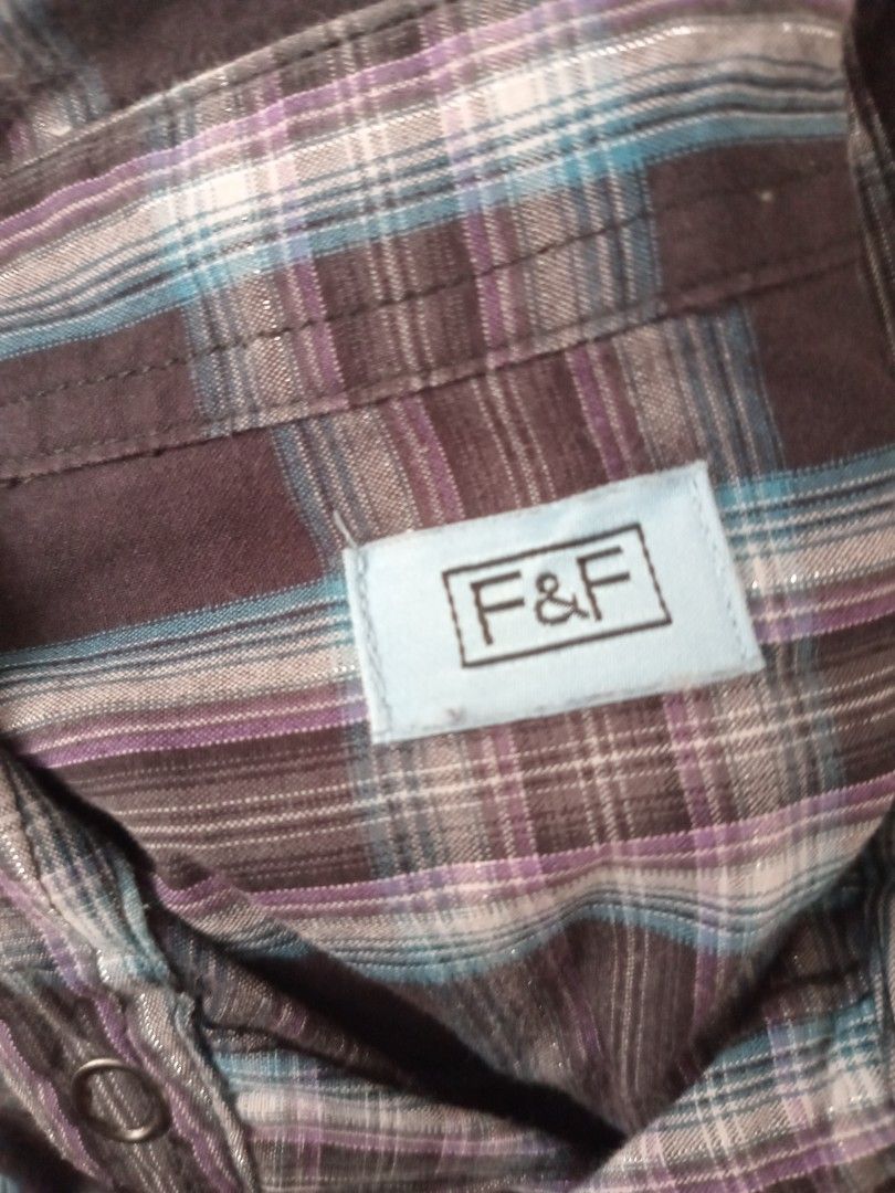 F & F Plaid Long sleeves polo (Category: Babies & Kids Fashion) located in Talavera. Submitted by kmskcart (Listing ID 1422094527, Image 2). Description: F & F Plaid Long sleeves polo fits 6-7 years old Height: 122 cm Chest: 62 cm - Button-down front - Two chest pockets - Long sleeves - Black, white, and violet plaid pattern.