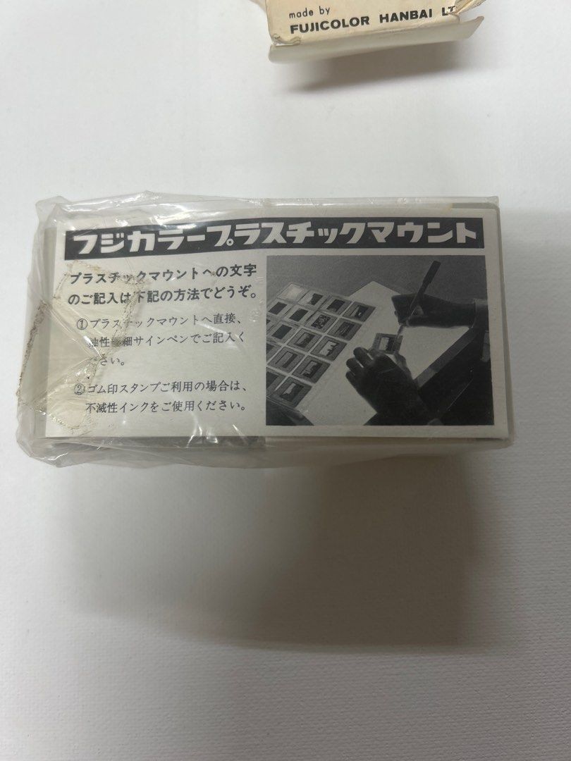 Fujicolor 35mm Plastic Slide Mounts (Category: Other Photography Accessories) located in Bulacan. Submitted by ourdailybreads (Listing ID 1422092286, Image 3). Description: Fujicolor 35mm plastic slide mounts. Each box contains 25 pieces. The packaging includes instructions in Japanese. These mounts are designed for full-size slides. Made by Fujicolor Hanbai Ltd..