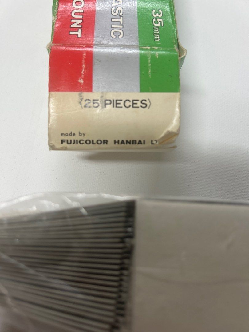 Fujicolor 35mm Plastic Slide Mounts (Category: Other Photography Accessories) located in Bulacan. Submitted by ourdailybreads (Listing ID 1422092286, Image 2). Description: Fujicolor 35mm plastic slide mounts. Each box contains 25 pieces. The packaging includes instructions in Japanese. These mounts are designed for full-size slides. Made by Fujicolor Hanbai Ltd..