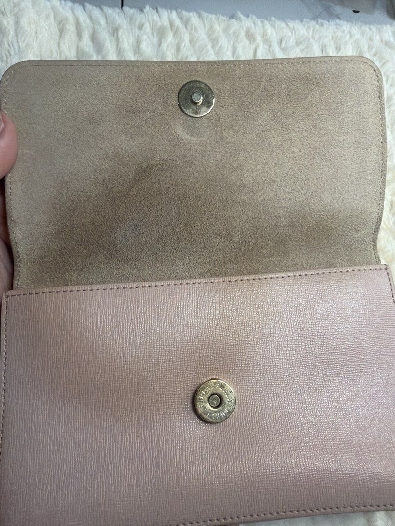Furla Crossbody Wallet Bag (Category: Luxury Bags & Wallets) located in Antipolo. Submitted by ambercs (Listing ID 1422094940, Image 3). Description: - Authentic Furla crossbody bag - Blush pink color - Long adjustable strap - Secure zip-around closure - Interior with multiple compartments and card slots - Genuine leather material - Furla logo on front and inside - authentic - preloved - cute and rare type - 2 pouch/ wallet in 1 - can fit iphone 