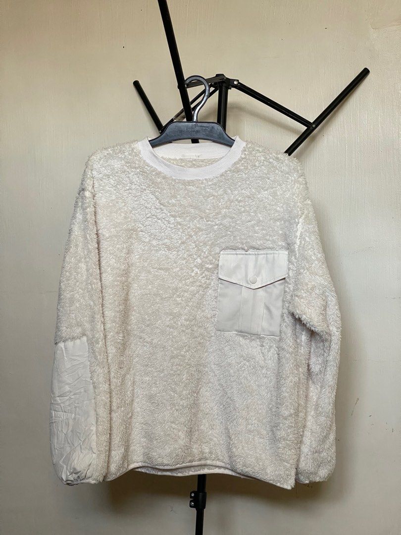 GU Fleece Sweater with Pocket (Category: Coats, Jackets and Outerwear) located in Cabanatuan. Submitted by iselect_finds (Listing ID 1422141475, Image 2). Description: GU fleece sweater Color Off white/ cream No issue Size M on tag Width 23.5 Length 27 - Unique chest pocket detail - Contrasting sleeve patch - Crew neck - Soft, textured fleece - Versatile for layering ₱380 plus shipping fee Loc: Nueva Ecija Via J&T courier .