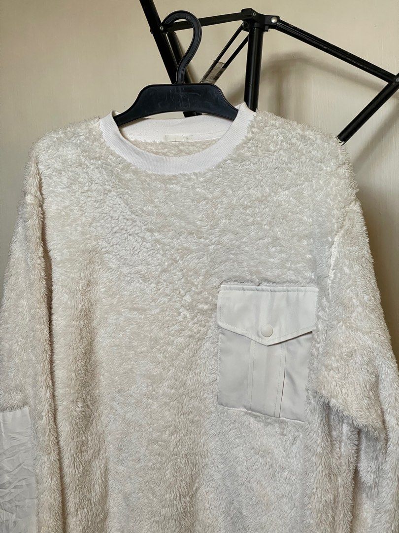 GU Fleece Sweater with Pocket (Category: Coats, Jackets and Outerwear) located in Cabanatuan. Submitted by iselect_finds (Listing ID 1422141475, Image 3). Description: GU fleece sweater Color Off white/ cream No issue Size M on tag Width 23.5 Length 27 - Unique chest pocket detail - Contrasting sleeve patch - Crew neck - Soft, textured fleece - Versatile for layering ₱380 plus shipping fee Loc: Nueva Ecija Via J&T courier .
