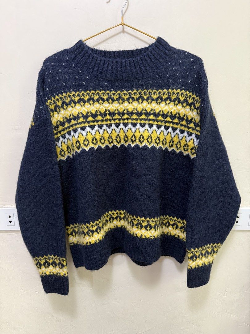GU Uniqlo Sweater - Navy Blue (Category: Coats, Jackets and Outerwear) located in Manila. Submitted by morningthrifters (Listing ID 1422153185, Image 1). Description: - Navy blue sweater - Fair isle pattern (yellow & white) - Mock neck - Long sleeves - Brand: GU - Size: M - Soft, wool blend - Good as new.