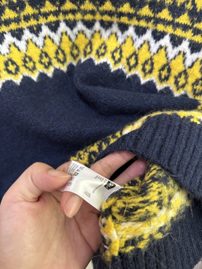 GU Uniqlo Sweater - Navy Blue (Category: Coats, Jackets and Outerwear) located in Manila. Submitted by morningthrifters (Listing ID 1422153185, Image 3). Description: - Navy blue sweater - Fair isle pattern (yellow & white) - Mock neck - Long sleeves - Brand: GU - Size: M - Soft, wool blend - Good as new.